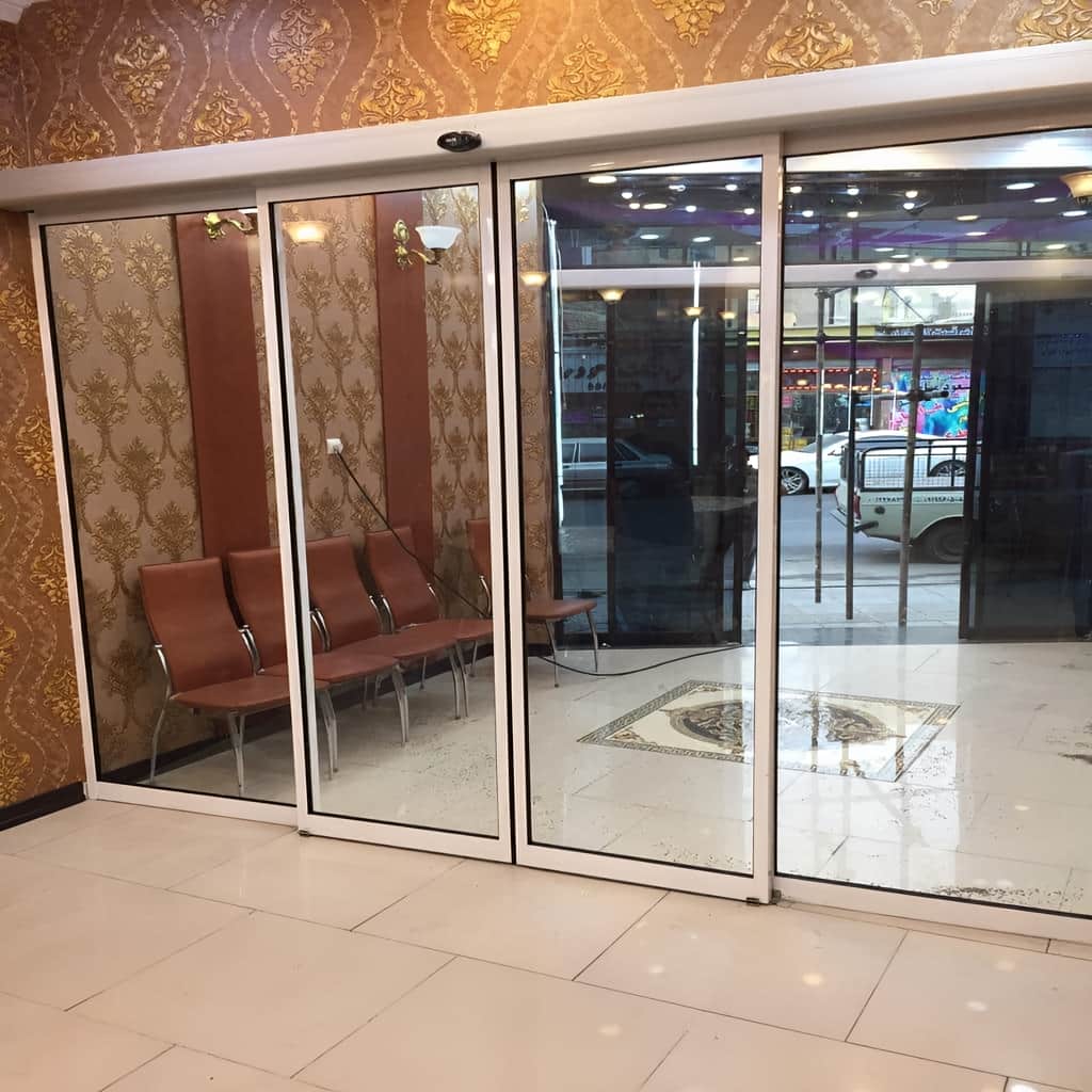 قیمت درب اتوماتیک شیشه ای کشویی در زاهدان با غلتک روان