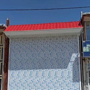 آردواز ورودی ساختمان زاهدان با رنگ خاکستری هماهنگ با نما